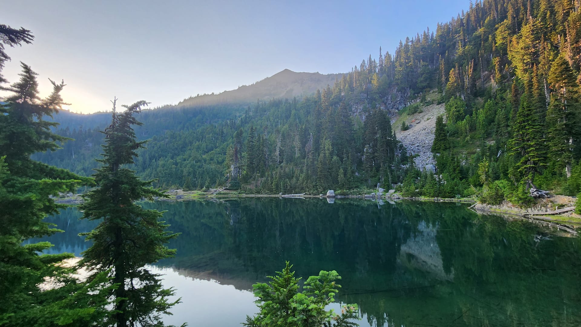 Golden light over a mountain lake on the Olympic Peninsula